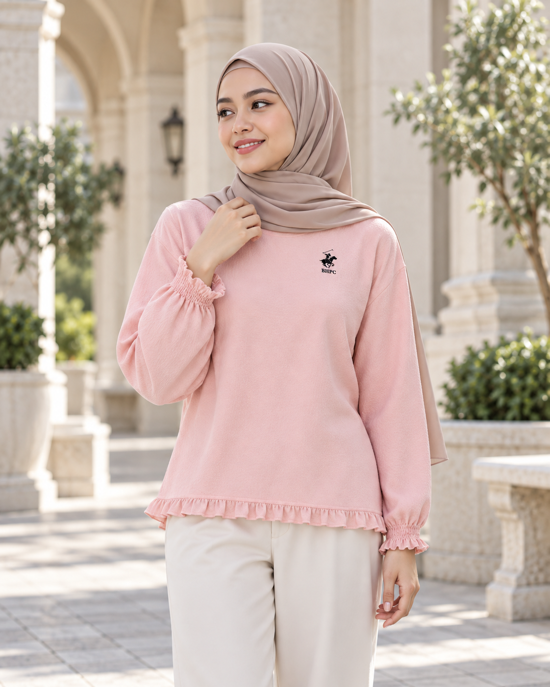 A softer silhouette: pink BHPC ruffle blouse